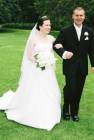[Jess and Andrew walk down the aisle]