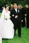 [Jess and Andrew walk down the aisle]