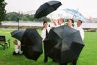 [the boys try and make the Opera House using umbrellas]
